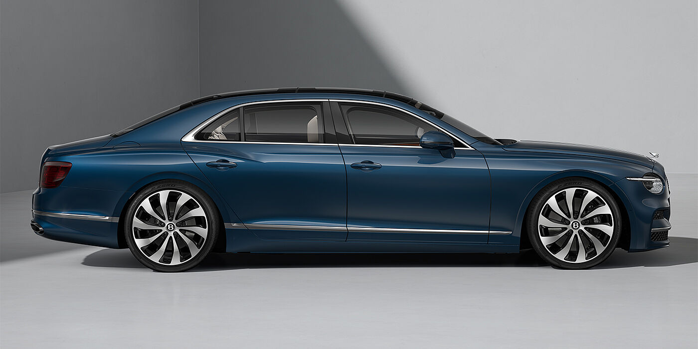 Gohm Sportwagen GmbH | Bentley Singen New Bentley Flying Spur sedan in Marlin blue paint profile with 22" Ten Spoke Black Painted and Bright Machined wheels