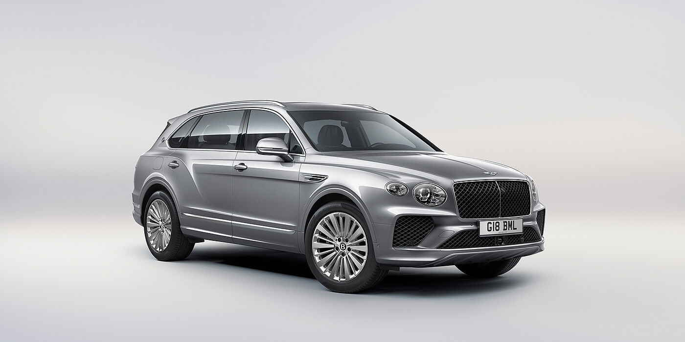 Gohm Sportwagen GmbH | Bentley Singen Bentley Bentayga Extended Wheelbase luxury SUV front three quarter view in Moonbeam paint with 21 inch five spoke painted wheels
