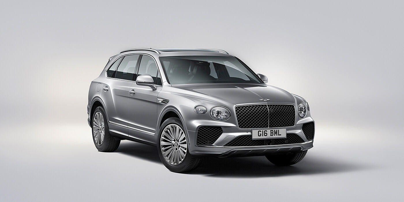 Gohm Sportwagen GmbH | Bentley Singen Bentley Bentayga luxury SUV front three quarter view in Moonbeam paint with matrix grille and 21″ 5 spoke painted wheels