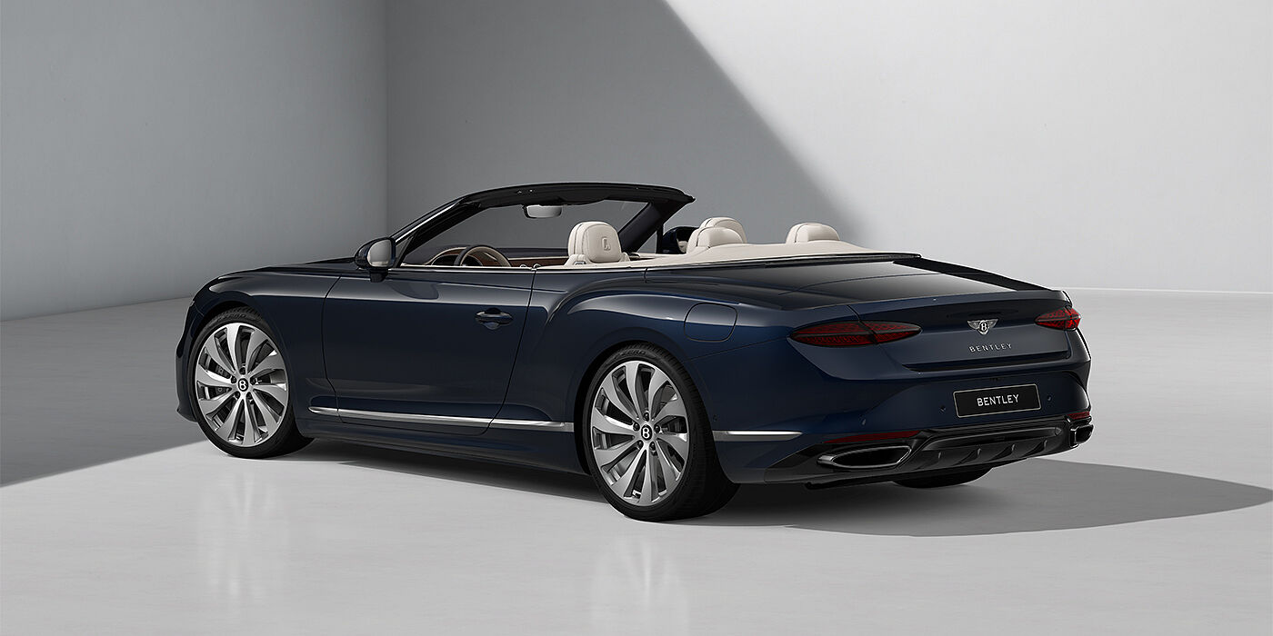 Gohm Sportwagen GmbH | Bentley Singen Bentley Continental GTC convertible in Dark Sapphire paint and 22" Ten Spoke wheels - rear 3/4