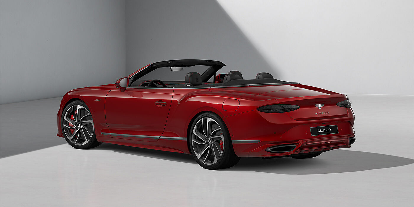 Gohm Sportwagen GmbH | Bentley Singen Bentley Continental GTC Speed convertible in Dragon Red paint and 22" swept spoke wheels - rear 3/4