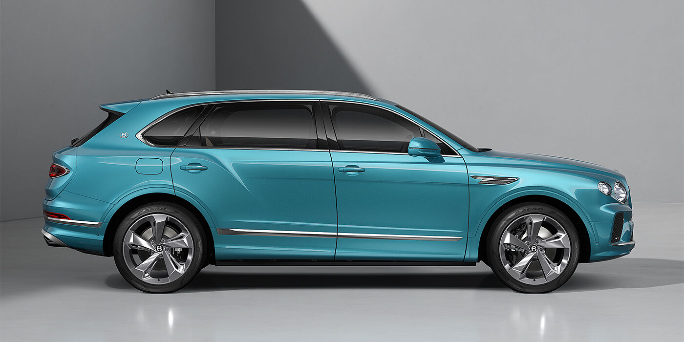 Gohm Sportwagen GmbH | Bentley Singen Bentley Bentayga EWB SUV in Light Windsor Blue paint and 22" Five Spoke Directional Polished wheels - profile