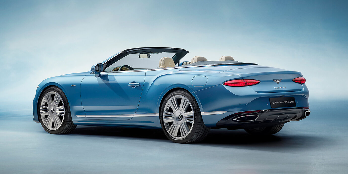 Gohm Sportwagen GmbH | Bentley Singen New Bentley Continental GTC Azure convertible rear view in Light Windsor blue paint with 22 inch ten spoke wheels and chrome exterior details