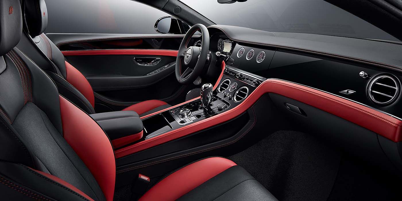 Gohm Sportwagen GmbH | Bentley Singen Bentley Continental GT S coupe front interior in Beluga black and Hotspur red hide with high gloss Carbon Fibre veneer