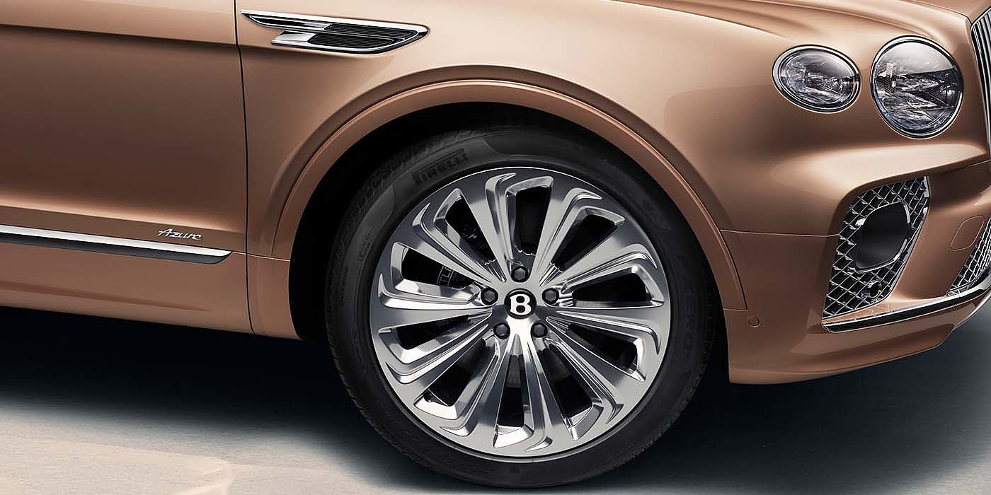 Gohm Sportwagen GmbH | Bentley Singen Bentley Bentayga EWB Azure SUV in Rose Gold paint 22 inch wheel