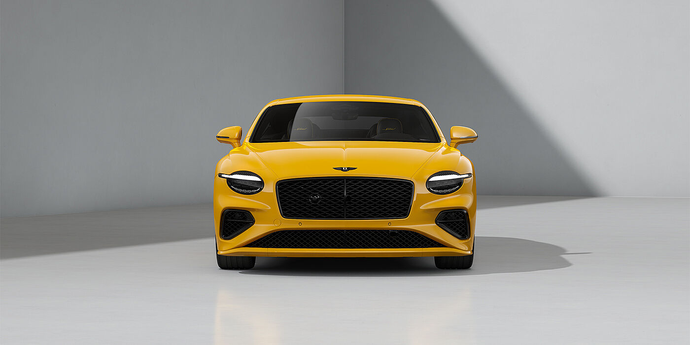 Gohm Sportwagen GmbH | Bentley Singen Bentley Continental GT Speed coupe in Monaco Yellow paint and 22" Ten spoke sport wheels - full front