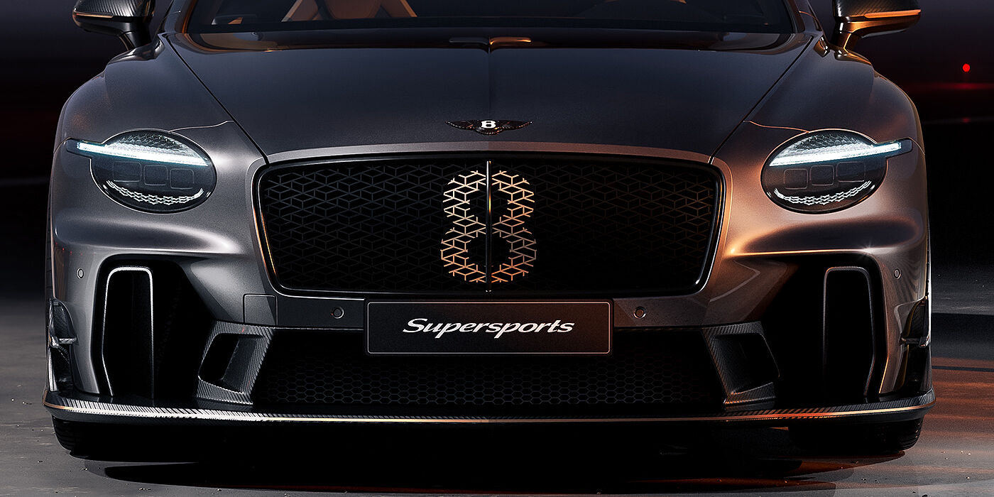 Gohm Sportwagen GmbH | Bentley Singen Bentley Supersports front exterior with illuminated head lamps and Supersports grille in Anthracite paint