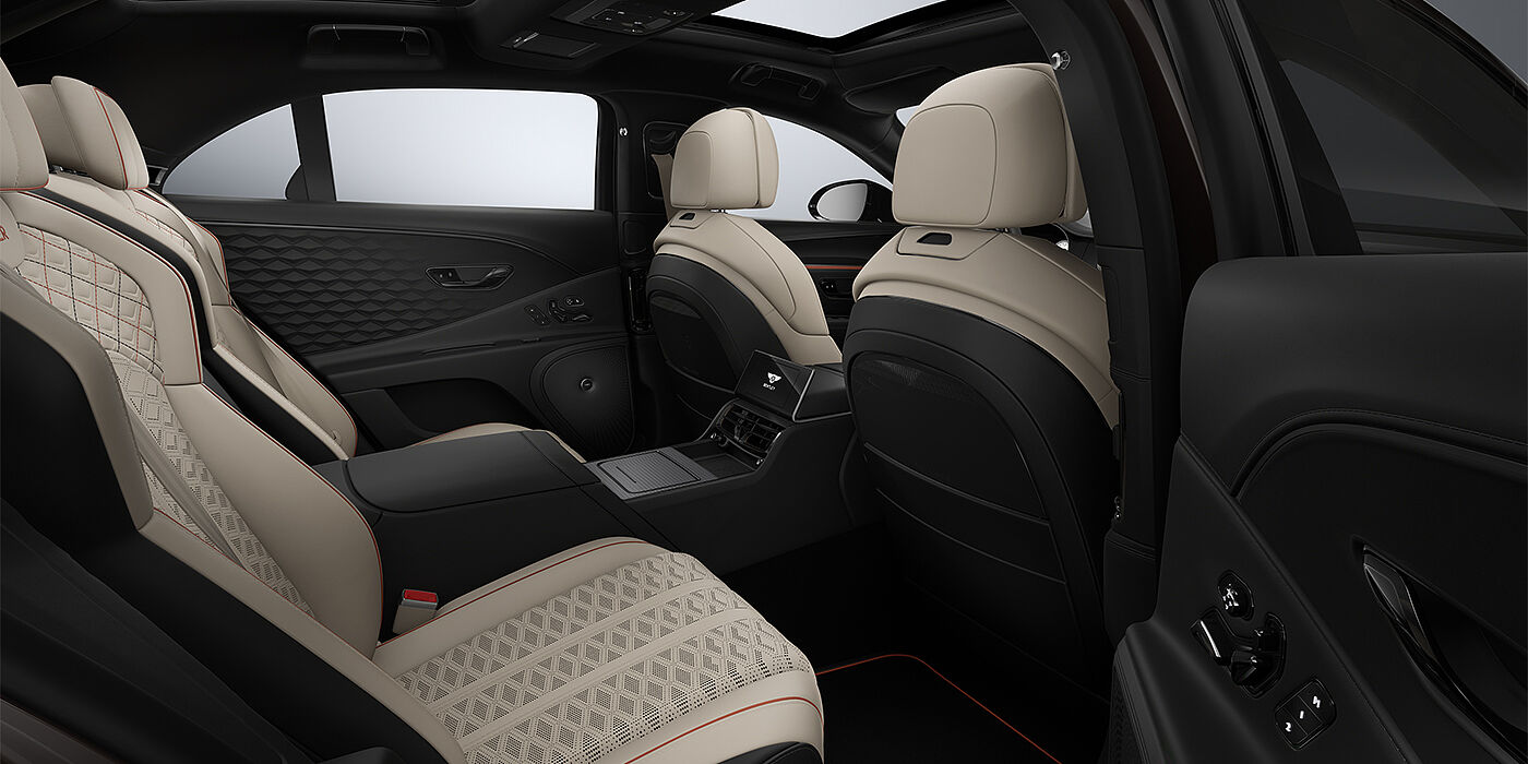 Gohm Sportwagen GmbH | Bentley Singen New Bentley Flying Spur Mulliner sedan rear interior in Portland and Beluga Black hides with Grand Black veneer