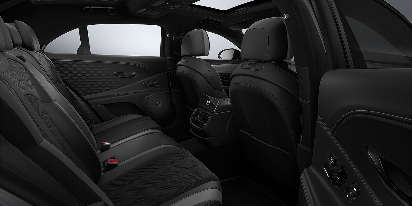Gohm Sportwagen GmbH | Bentley Singen New Bentley Flying Spur Speed sedan rear interior in Gravity Grey and Beluga Black hides with Diamond Brushed Dark Tint Aluminium veneer