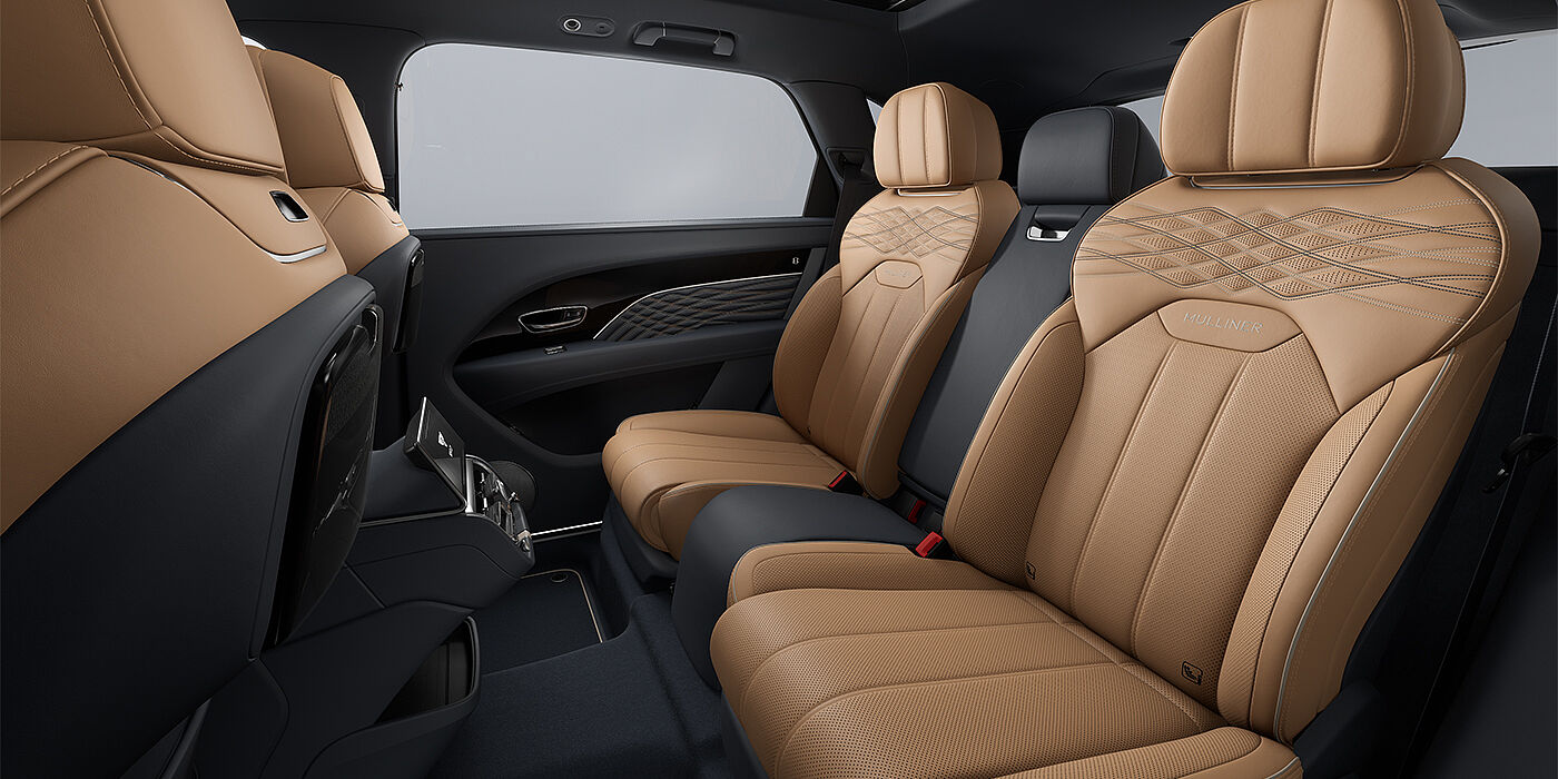 Gohm Sportwagen GmbH | Bentley Singen Bentley Bentayga EWB Mulliner SUV rear interior in Camel and Brunel hides with Mulliner contrast stitching