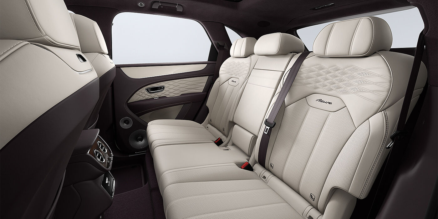 Gohm Sportwagen GmbH | Bentley Singen Bentley Bentayga Azure SUV rear interior in Linen and Damson hides and Azure seat stitching