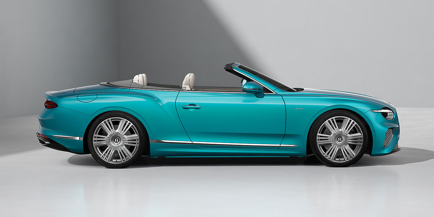 Gohm Sportwagen GmbH | Bentley Singen Bentley Continental GTC Azure convertible in Topaz Blue paint and 22" Azure wheels - profile