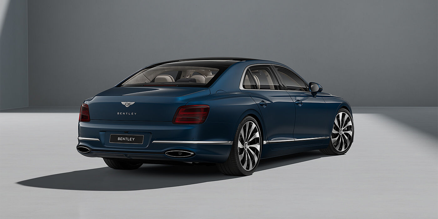 Gohm Sportwagen GmbH | Bentley Singen New Bentley Flying Spur sedan in Marlin blue paint rear 3/4 with 22" Ten Spoke Black Painted and Bright Machined wheels