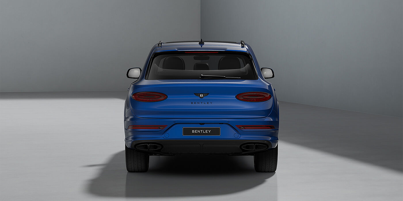 Gohm Sportwagen GmbH | Bentley Singen Bentley Bentayga Artenara Edition SUV in Sequin Blue paint and 22" Mulliner Gloss Black wheels front 3/4 full rear