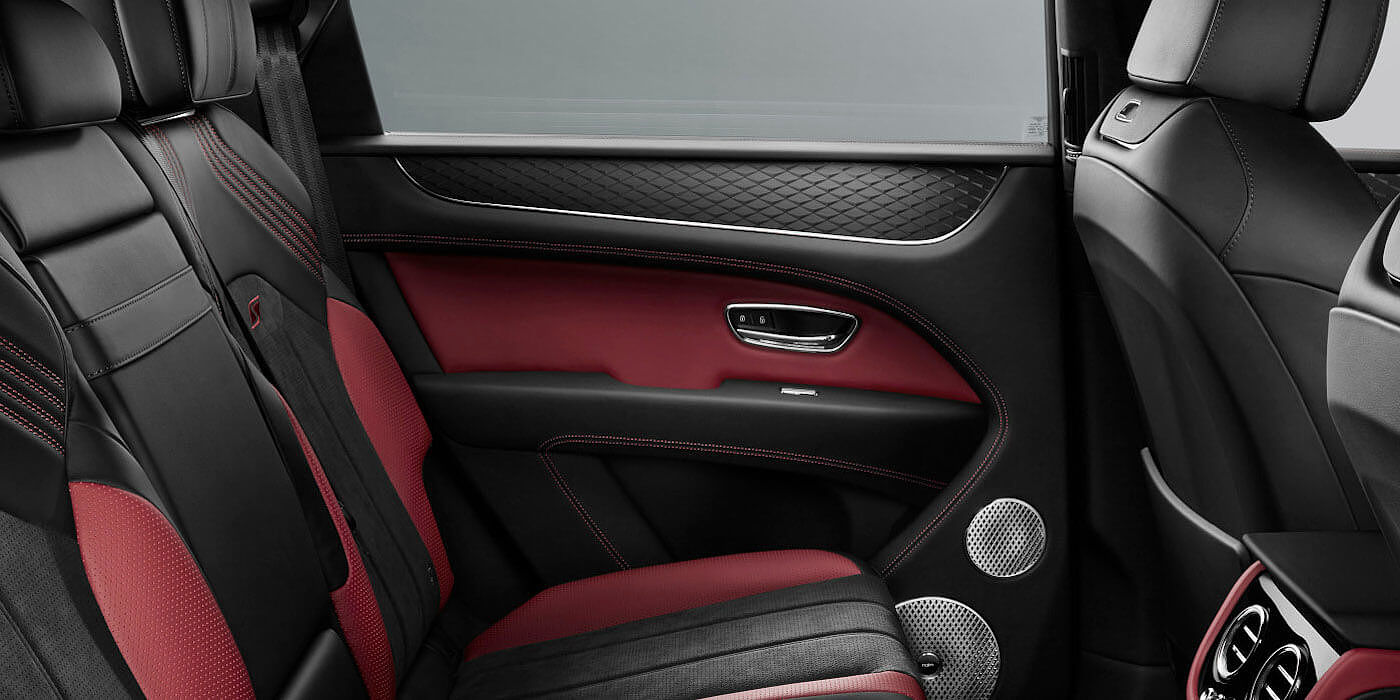 Gohm Sportwagen GmbH | Bentley Singen Bentley Bentayga S SUV rear interior in Beluga black and Hotspur red hide