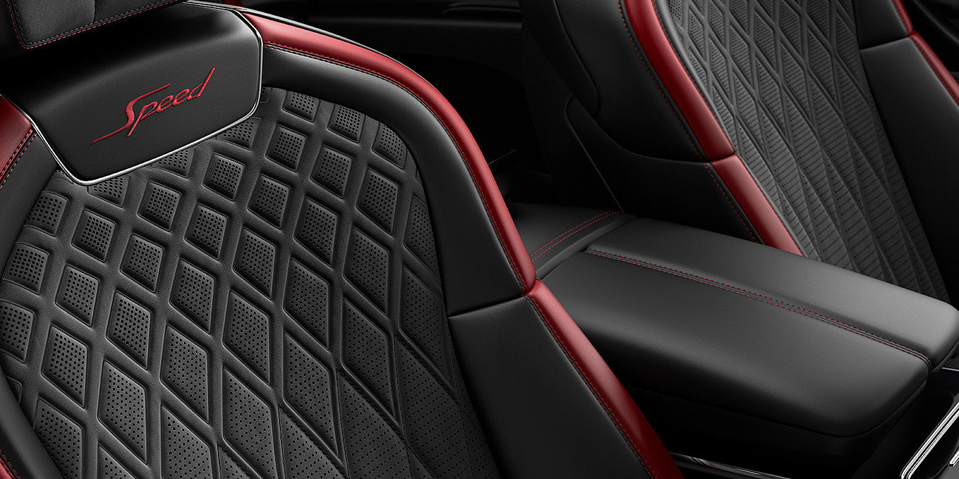 Gohm Sportwagen GmbH | Bentley Singen Bentley Flying Spur Speed sedan seat stitching detail in Beluga black and Cricket Ball red hide