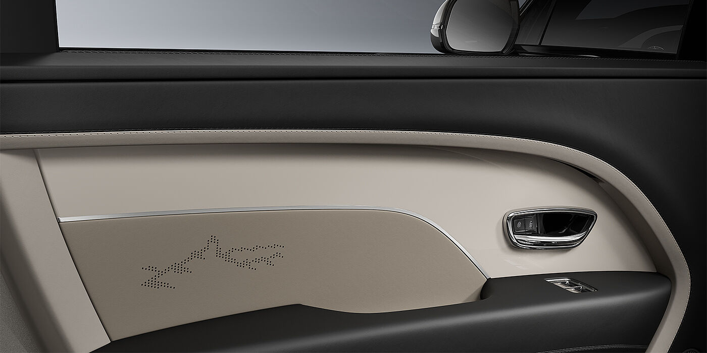 Gohm Sportwagen GmbH | Bentley Singen Bentayga EWB Artenara Edition SUV door detail in Portand and Beluga Black hides with Piano Linen veneer and Artenara detail