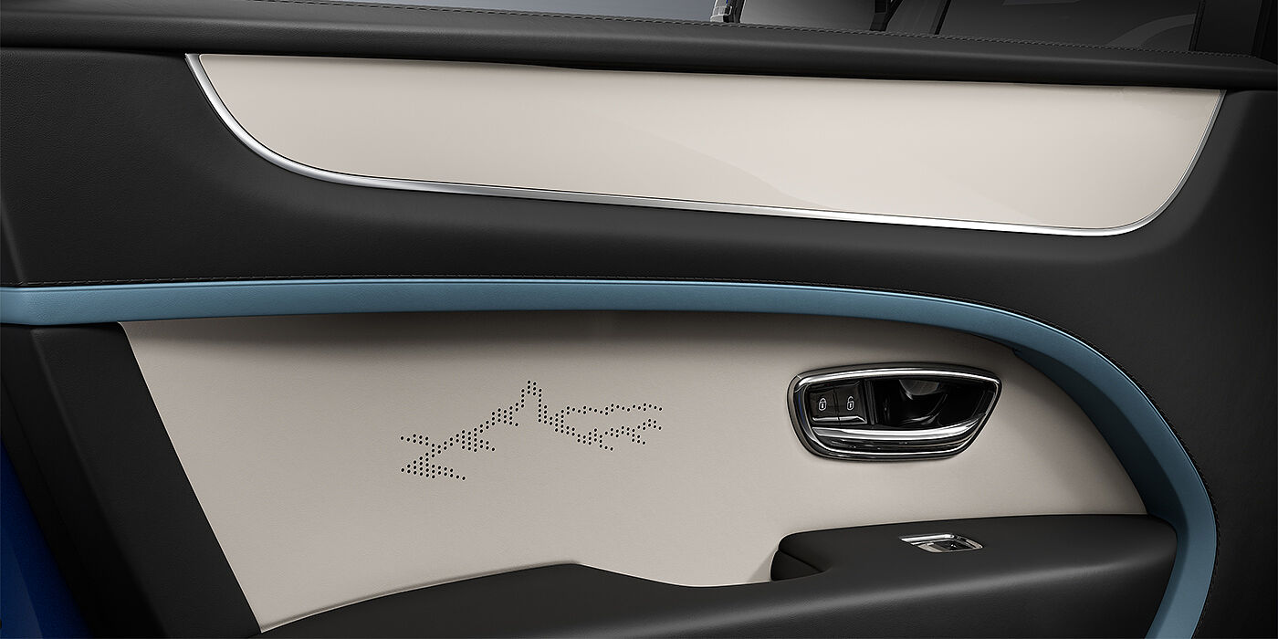 Gohm Sportwagen GmbH | Bentley Singen Bentley Bentayga Artenara Edition SUV door detail wity Piano Linen veneer and Linen and Beluga Black hides with Light Blue accents with Artenara detail