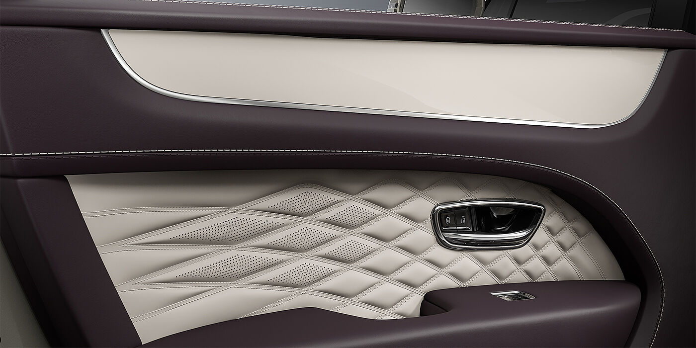 Gohm Sportwagen GmbH | Bentley Singen Bentley Bentayga EWB Azure SUV door interior detail in Linen and Damson hides with Piano Linen veneer
