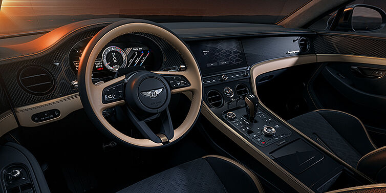Gohm Sportwagen GmbH | Bentley Singen Bentley Supersports front interior in Beluga and Camel hides with Bronze accents and high gloss black carbon fibre veneer.