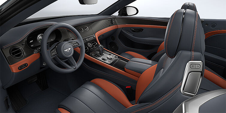 Gohm Sportwagen GmbH | Bentley Singen Bentley Continental GTC S convertible interior in Newmarket Tan and Beluga Black hides with Carbon Fibre veneer
