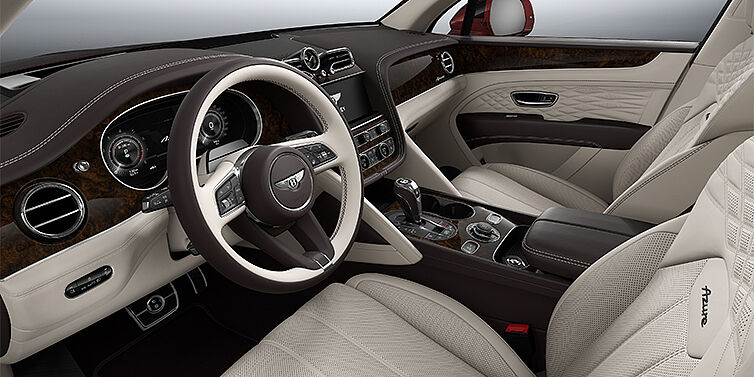 Gohm Sportwagen GmbH | Bentley Singen Bentley Bentayga EWB Azure SUV front interior in Linen and Burnt Oak hides with Dark Stained Burr Walnut veneer