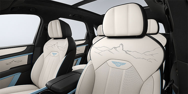 Gohm Sportwagen GmbH | Bentley Singen Bentley Bentayga Artenara Edition SUV front seats in Linen and Beluga Black hides with Light Blue accents and Artenara stitch detail