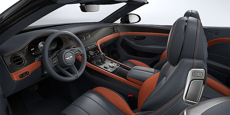 Gohm Sportwagen GmbH | Bentley Singen Bentley Continental GTC S convertible interior in Newmarket Tan and Beluga Black hides with Carbon Fibre veneer