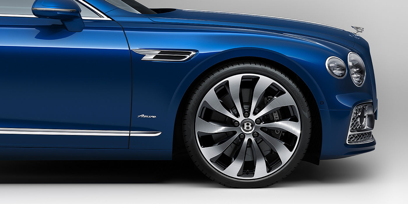 Gohm Sportwagen GmbH | Bentley Singen Bentley Flying Spur Azure sedan side close up in Sequin Blue paint with Azure badge