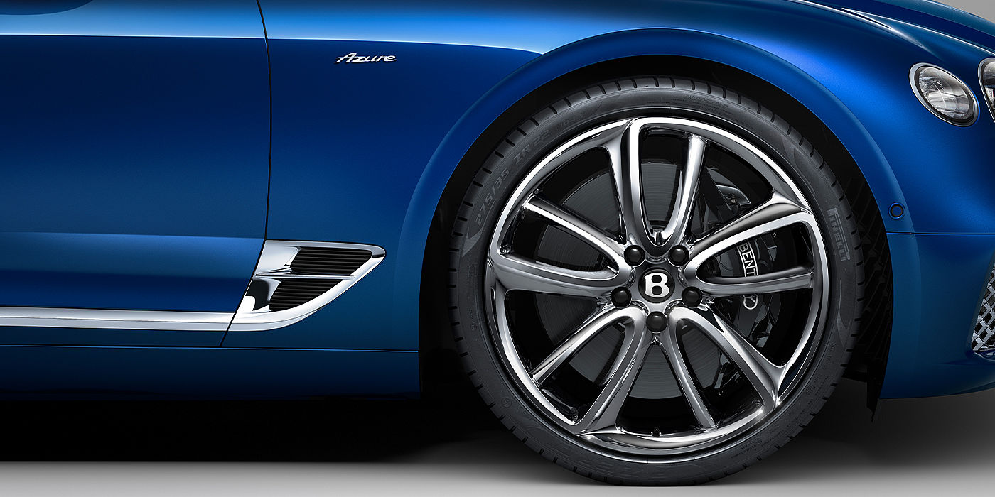 Gohm Sportwagen GmbH | Bentley Singen Bentley Continental GTC Azure convertible in Sequin Blue paint side profile with Azure badge close up