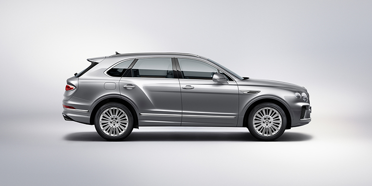 Gohm Sportwagen GmbH | Bentley Singen Bentley Bentayga SUV side profile in Moonbeam silver paint against white background featuring 21 inch 5 spoke wheels