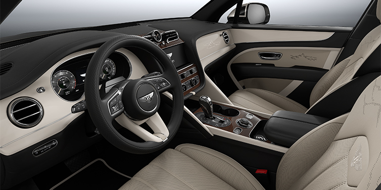 Gohm Sportwagen GmbH | Bentley Singen Bentayga EWB Artenara Edition SUV front interior in Portand and Beluga Black hides with Piano Linen veneer