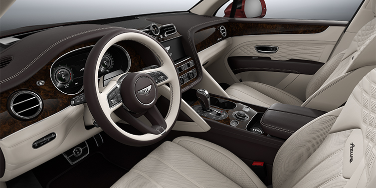 Gohm Sportwagen GmbH | Bentley Singen Bentley Bentayga EWB Azure SUV front interior in Linen and Burnt Oak hides with Dark Stained Burr Walnut veneer