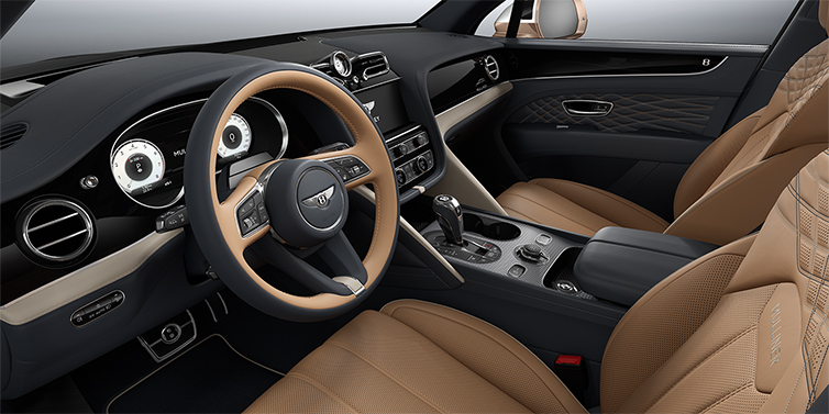 Gohm Sportwagen GmbH | Bentley Singen Bentley Bentayga EWB Mulliner SUV front interior in Camel and Brunel hides with Grand Black veneer and Aluminium console