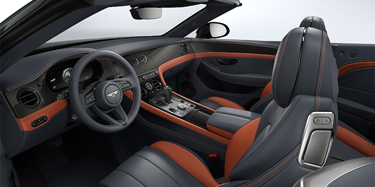 Gohm Sportwagen GmbH | Bentley Singen Bentley Continental GTC S convertible interior in Newmarket Tan and Beluga Black hides with Carbon Fibre veneer