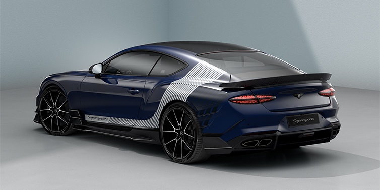 Gohm Sportwagen GmbH | Bentley Singen Bentley Supersports rear three quarter in "Skies" Design theme with Electric Blue paint finish and Arctica white and Oxford blue paint stripes across the rear haunch.