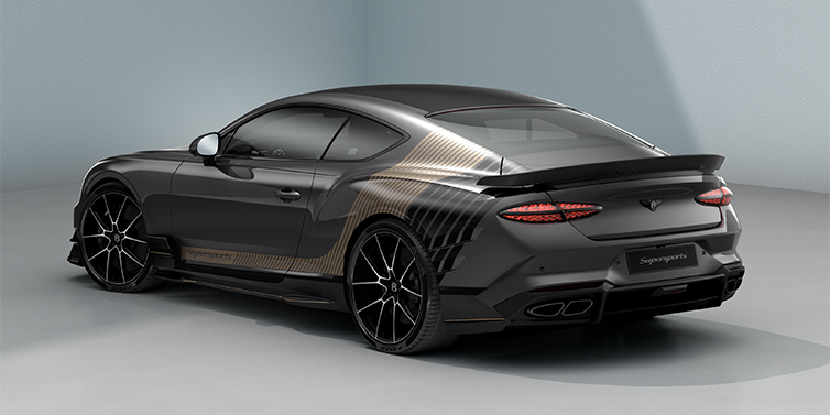Gohm Sportwagen GmbH | Bentley Singen Bentley Supersports rear three quarter in "Nightfall Design theme with Anthracite paint and Beluga black and Camel brown paint stripes across the rear haunch.