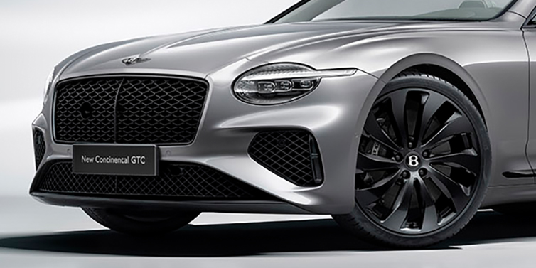 Gohm Sportwagen GmbH | Bentley Singen New Bentley Continental GTC bonnet in Silverlake paint and Black Specification, featuring black 22 inch ten spoke wheels and black matrix grille and exterior finishes