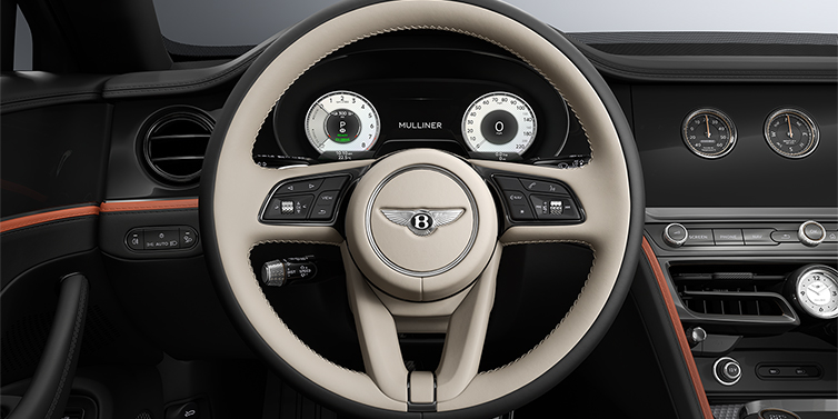 Gohm Sportwagen GmbH | Bentley Singen New Bentley Flying Spur Mulliner sedan steering wheel and dash in Portland and Beluga Black hides and Grand Black veneer