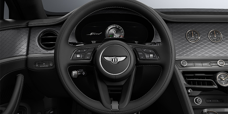 Gohm Sportwagen GmbH | Bentley Singen New Bentley Flying Spur Speed sedan steering wheel and dash in Gravity Grey and Beluga black hides and Diamond Brushed Dark Tint Aluminium veneer
