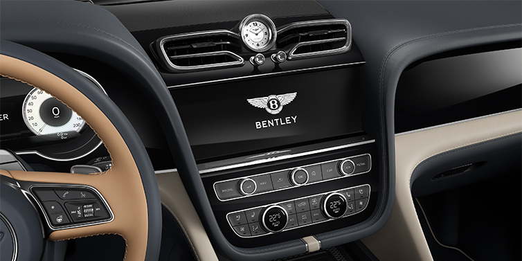 Gohm Sportwagen GmbH | Bentley Singen Bentley Bentayga EWB Mulliner SUV centre console detail showing Bentley Wings