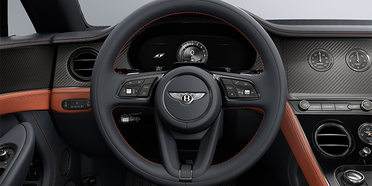 Gohm Sportwagen GmbH | Bentley Singen Bentley Continental GTC S convertible steering wheel and dash in Newmarket Tan and Beluga Black hides with Carbon Fibre veneer